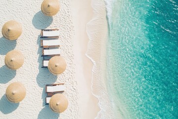 Wall Mural - a beach with chairs and umbrellas next to the ocean