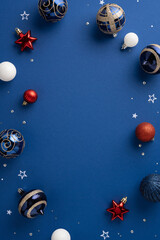 Sticker - Festive Christmas vertical baubles and stars arranged on a vibrant blue background, creating a joyful holiday atmosphere with touches of red, white, and gold