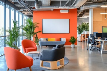 Modern office space with colorful seating, plants, and a large screen for presentations.