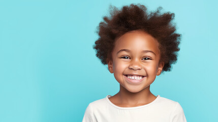 Portrait of smiling cute African American child girl with short haircut problem, light blue background, banner.