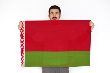 Young man holding Belarus flag, celebration or campaigning concept, protest or social issues in 