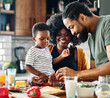 © Lumos sp - child family kitchen food boy son mother father breakfast preparing egg morning healthy diet eating home black african american father cooking, parent, cute, meal