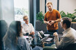 © Jacob Lund - Business professionals brainstorming ideas and solutions for a project