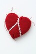 © Chisanu - A symbolic image of a broken heart being stitched back together, emotional recovery, healing from trauma