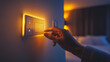 © karn - Close-Up of Hand Adjusting Light with Dimmer Switch