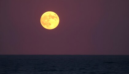 Wall Mural - A full moon rising over a dark ocean at sunset, with an orange and red sky in the background