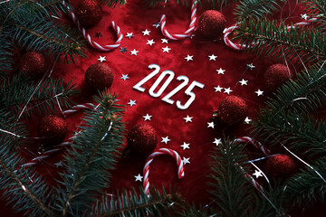 Wall Mural - new year red 2025 background. number of the coming year in christmas decoration.