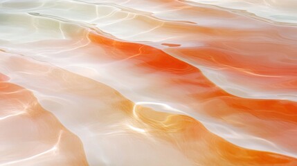 Wall Mural - the image is of a body of water with a pinkish-orange hue