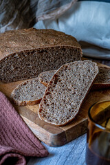 slice of rustic bread on a dark background and breakfast set. 