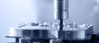 © Parilov - Modern CNC milling machine during operation. Produced cutting metal parts, industry heavy factory