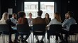 © angel_nt - A diverse group of individuals sits around a table, engaged in lively discussions. They are gathered in a contemporary meeting room, surrounded by large windows