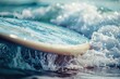 © Fotograf - A close-up view of a surfboard floating on the surface of the ocean, ready for a ride