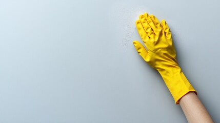 Hands with yellow gloves as a symbol of a commercial cleaning company