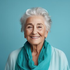 Turquoise background Happy european white Woman grandmother realistic person portrait of young beautiful Smiling Woman Isolated on Background Banner with copyspace 