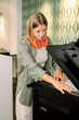 © Franci Leoncio - young woman using a photocopier in a modern office