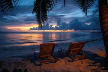 Canvas Print - Two wooden chairs placed on the sandy beach