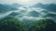 © Vertigo Images - A breathtaking view of rolling hills shrouded in mist, with a soft, ethereal glow in the distance.