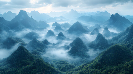 Wall Mural - Mystical mountains shrouded in mist, a breathtaking view of nature's beauty.