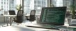 © ROMAN - A laptop with green code on the screen sits in an open office space. Programming work time