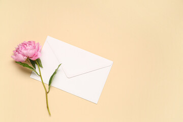 Sticker - Envelope and beautiful peony flower on color background