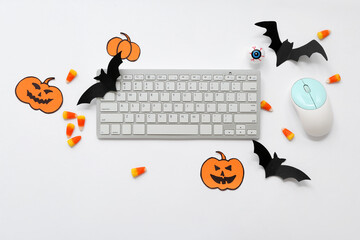 Wall Mural - Composition with modern computer keyboard, mouse and Halloween decorations on white background