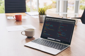 Software development programming on computer screen for modish application and program coding