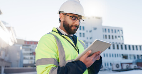 Poster - Man, engineer or tablet on rooftop for construction planning, building maintenance or architecture. Contractor, typing or tech for project management in city for infrastructure development feedback