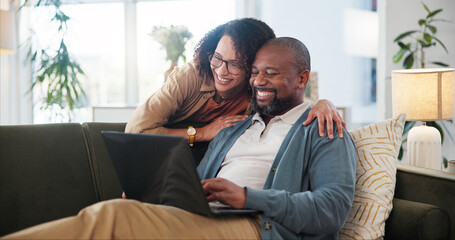 Fototapete - Laptop, relax and couple on sofa in home for research on holiday planning with flight ticket. Computer, living room and mature man and woman reading online review for hotel booking with travel.