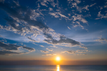 Sunset sky, Nature beautiful Light Sunset or sunrise over sea, Colorful dramatic majestic scenery sky,Amazing clouds and waves in sunset sky nature light cloud background