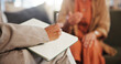 © WesLens/peopleimages.com - Book, counseling and hand of therapist writing notes for client with mental health evaluation. Paper, medical information and psychiatrist with patient for psychology assessment or review in office.