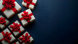 © sarinya - Gift Boxes with Red Bows on Blue Background