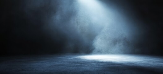 Wall Mural - A single spotlight shines through a foggy, dark blue haze on a textured surface.