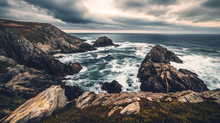 A dramatic coastline with dark cliffs and stormy ocean waves.