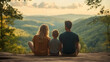 © Siasart Stock - A family enjoying a serene sunset view over the mountains.