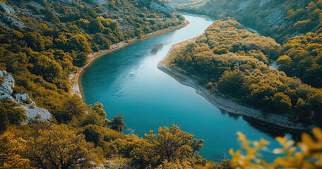 Wall Mural - A river from a high vantage point with a winding path visible. Generative AI.