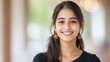 © Niks Ads - young indian college girl standing at college campus