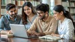 © Htet Wai Phyo - Indian students engaged in a group study session at a library, collaborating and sharing knowledge.
