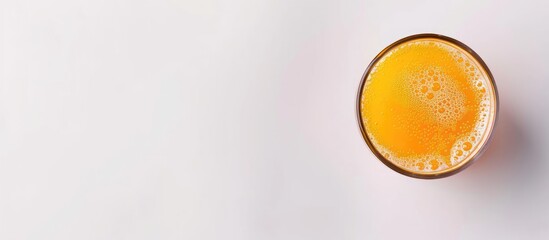 Poster - Healthy drink of orange juice in a glass on a white background top view copy space