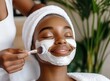© dreamdes - Young woman receiving facial mask in spa salon. African american female. Beauty treatment and skincare procedure concept. Wellness and relaxation. Banner, advertisement. Close-up portrait