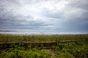 Wall Mural - Cloudy skies over Higgins beach Maine