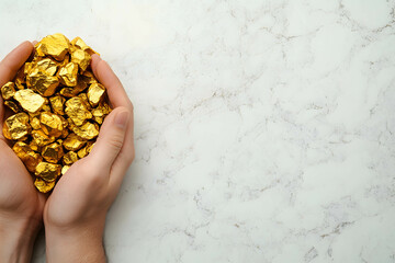 Wall Mural - A person is holding a bunch of gold. The gold is shiny and heavy. The discovery and increasing demand for gold.