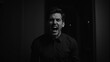 © Antonio - A man in a dark room screams loudly