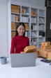 © Jirapong - woman, online seller, efficiently manages customer orders and delivery through the e-commerce platform