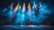 © Nattapong - Stage lights backdrop with vibrant blue beams casting a cool and immersive glow over the stage