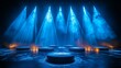 © Nattapong - Stage lights backdrop with vibrant blue beams casting a cool and immersive glow over the stage