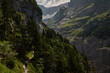 © JaviJfotografo - Hiking to the Gletscherschlucht glacier in Grindelwald, with imposing canyons, waterfalls and panoramic views of the valley. Swiss Alps