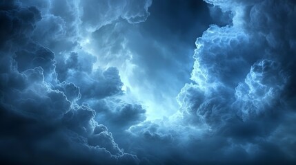 Dramatic blue storm clouds with intricate light patterns in a dynamic sky