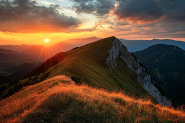 Sunset view over a mountain ridge with glowing warm light and dramatic sky creating a serene and picturesque landscape