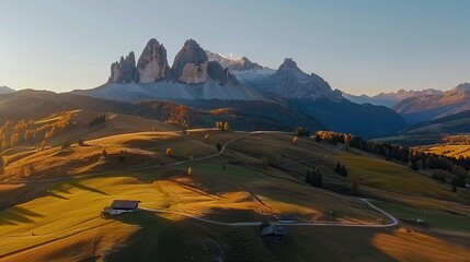 Wall Mural - Majestic Mountain Range With Lush Green Valley and Winding Road