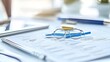 © Phichaphat - Glasses on Paperwork - Business Desk Essentials